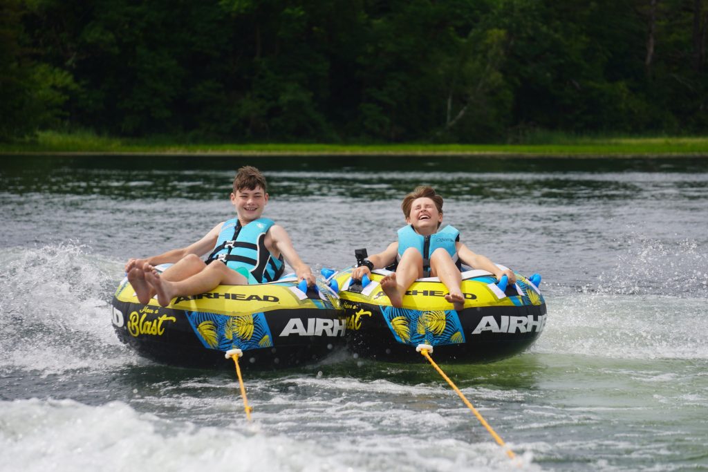 boys tubing on lake fairlee